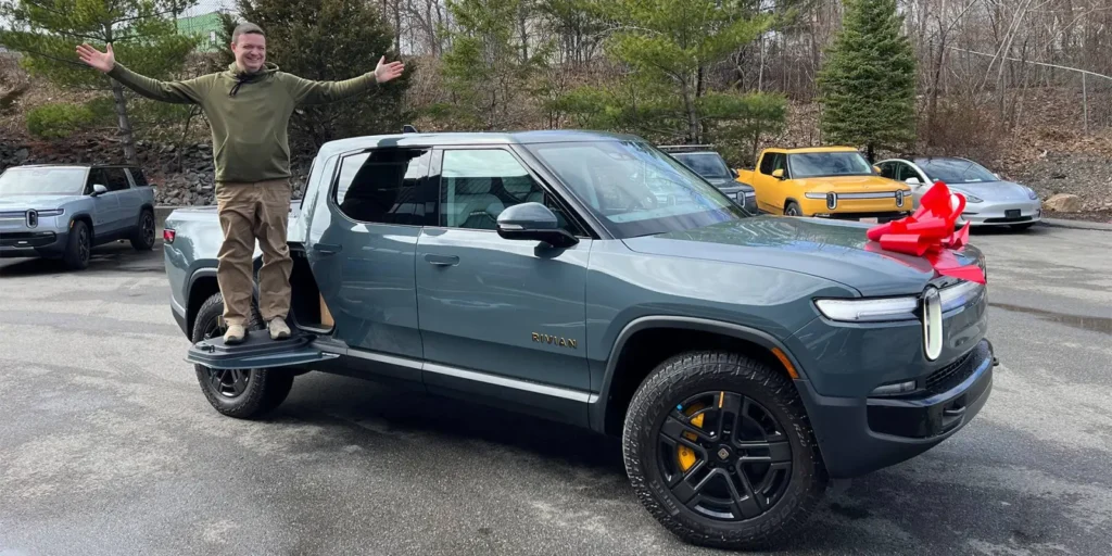 Man standing on a Rivian R1T