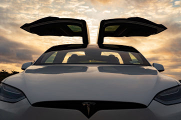 Image of a 2022 Tesla Model X Plaid at sunset